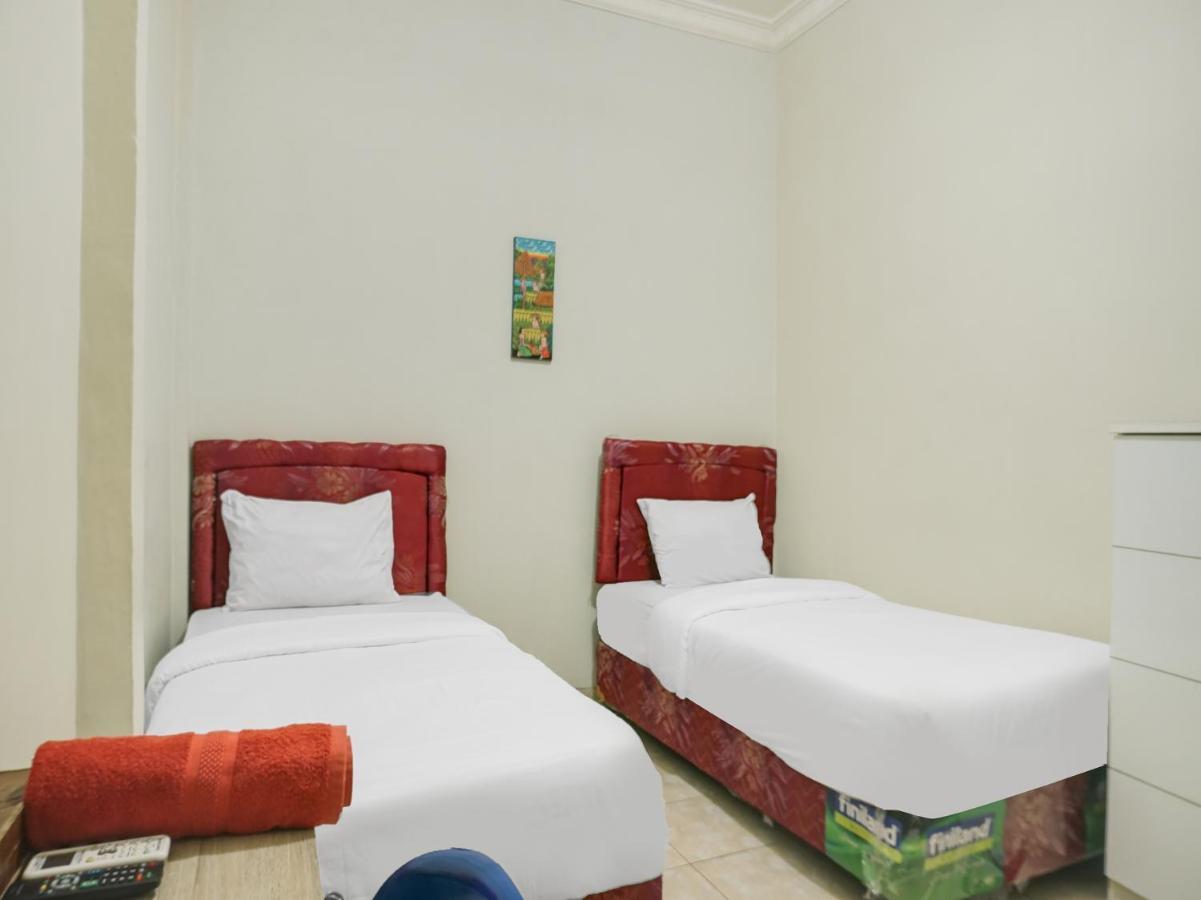 Oyo 2872 Garuda Guest House Banjarmasin  Buitenkant foto